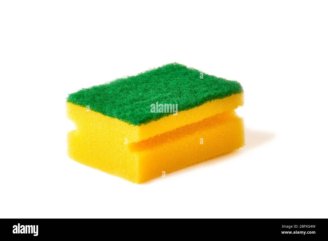 yellow dish washing sponge isolated on white. Stock Photo