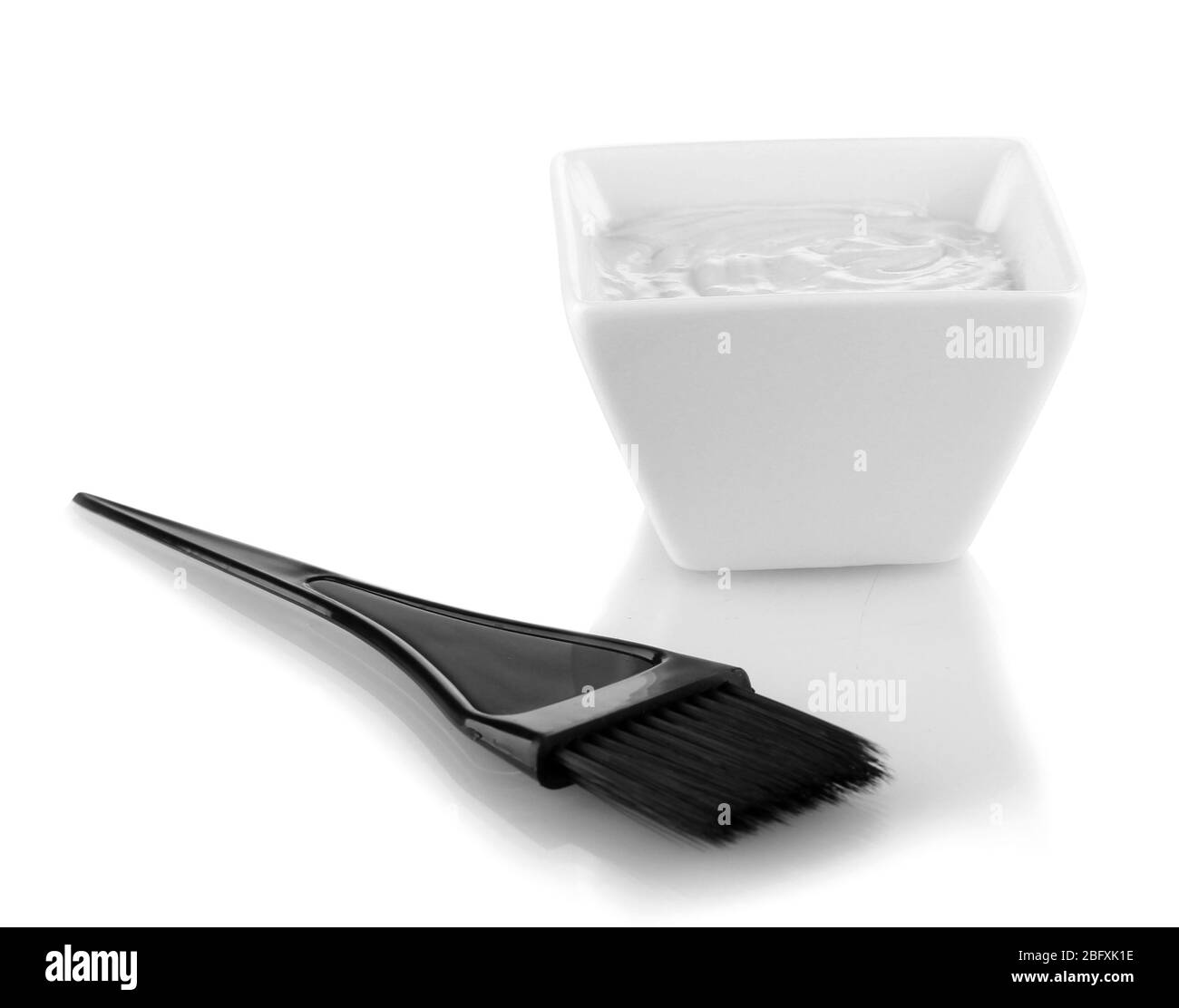 Bowl with hair dye and black brush for hair coloring, isolated on white Stock Photo Alamy
