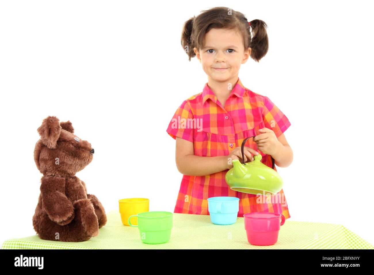 beautiful little girl and tea party isolated on white Stock Photo - Alamy