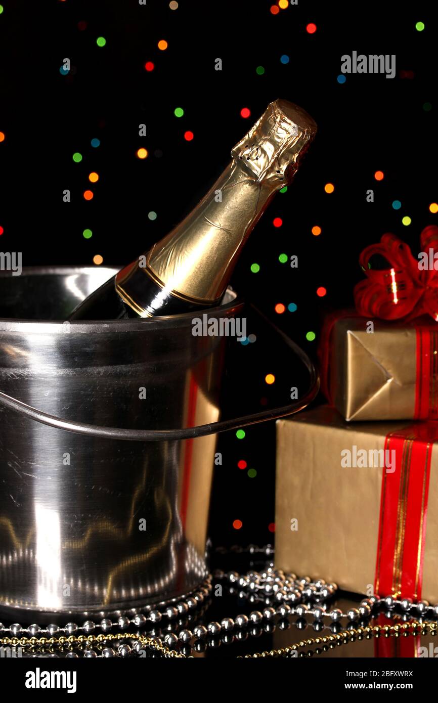 Celebratory champagne on Christmas lights background Stock Photo - Alamy