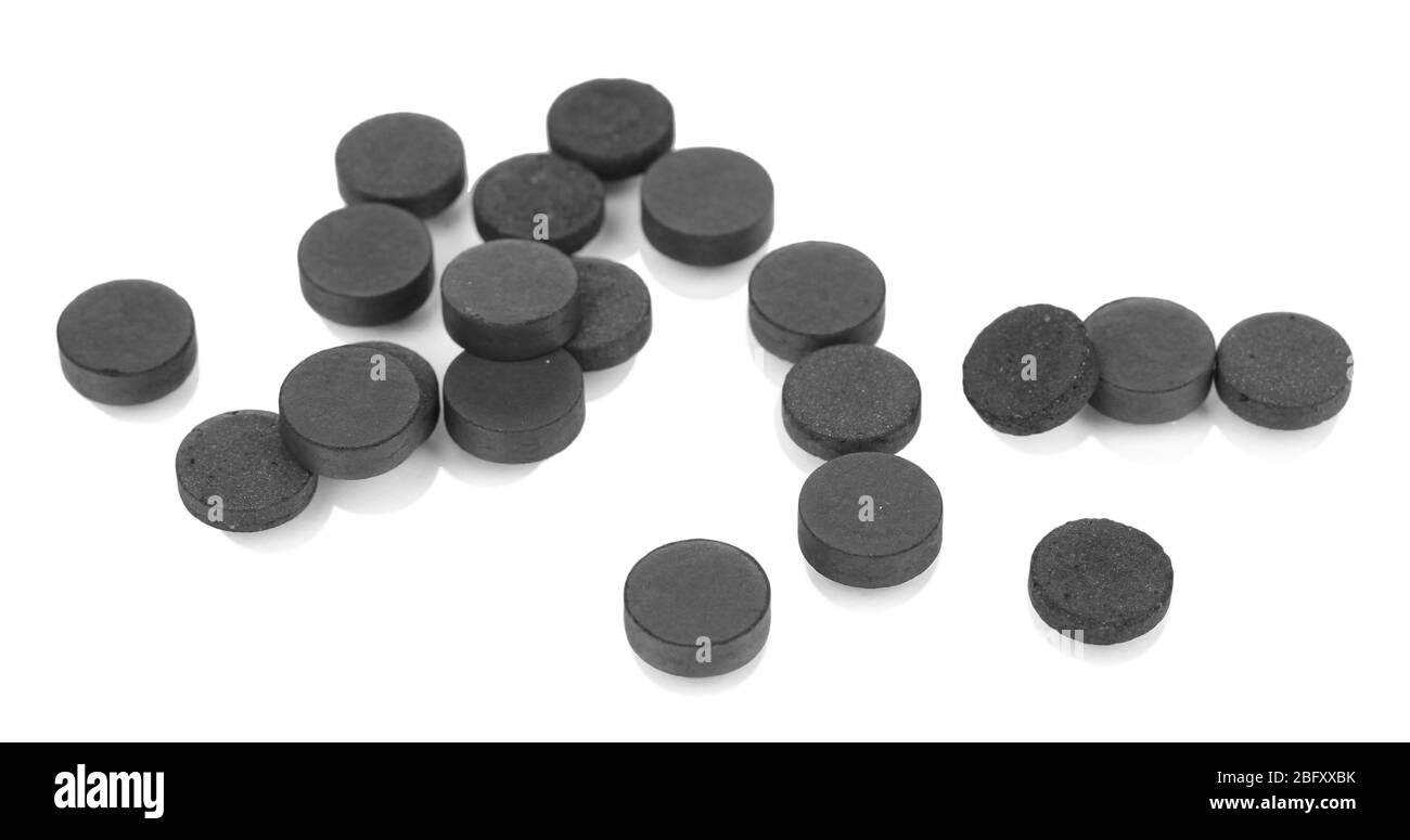 activated carbon in tablets isolated on white Stock Photo Alamy
