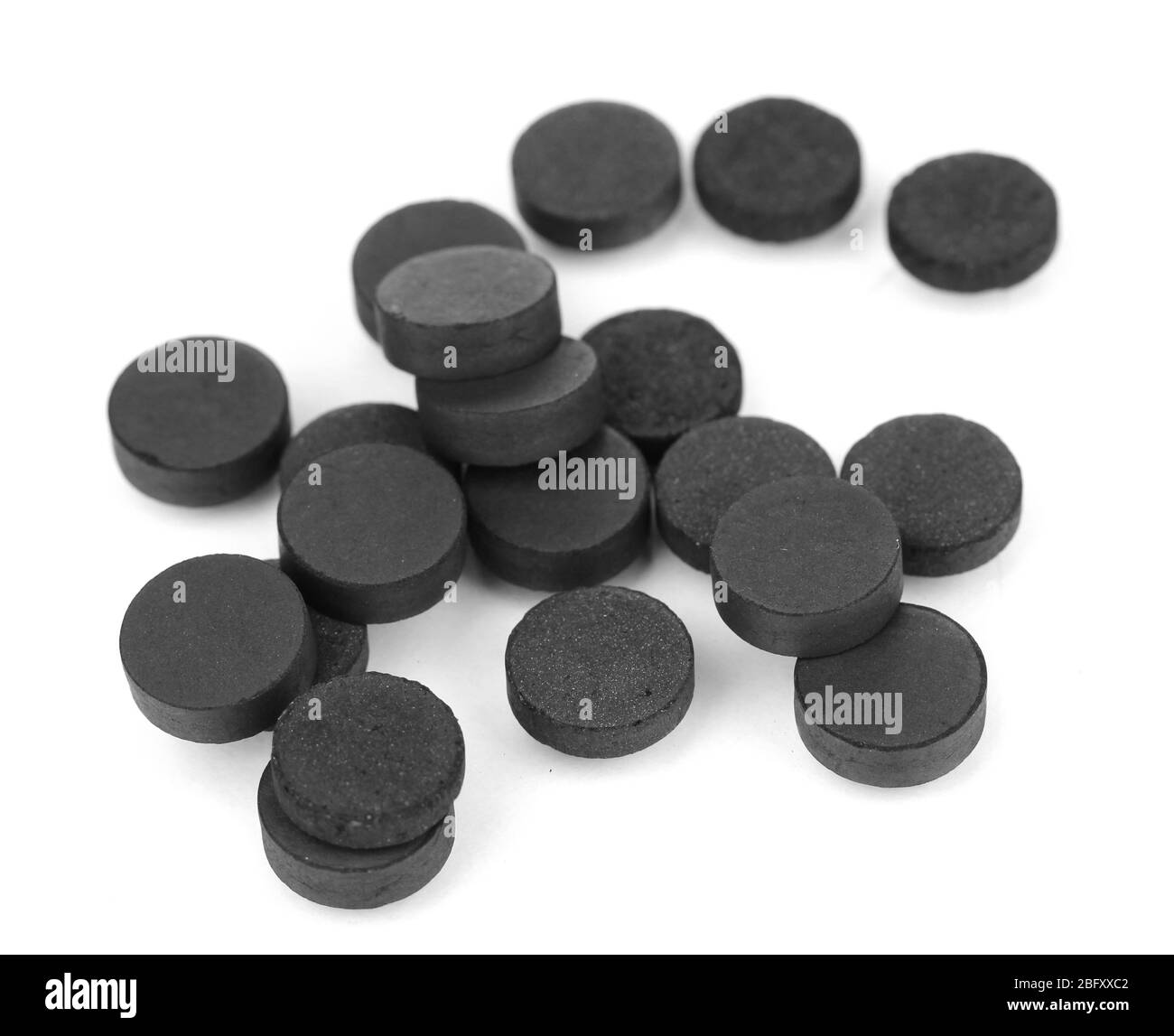 activated carbon in tablets isolated on white Stock Photo Alamy