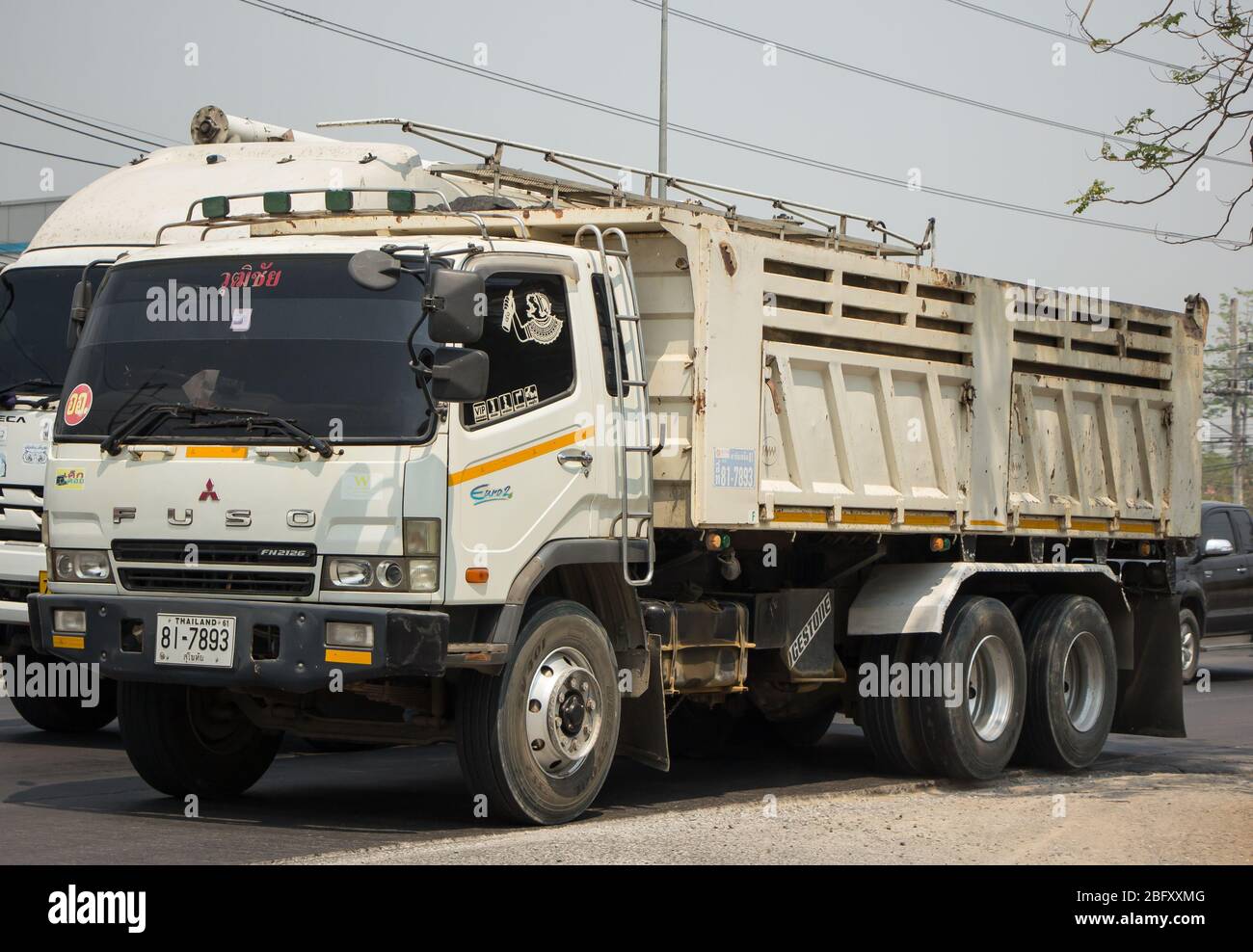 Chiangmai, Thailand -  March  23 2020: Private Mitsubishi Fuso Dump Truck.  Photo at road no.121 about 8 km from downtown Chiangmai, thailand. Stock Photo
