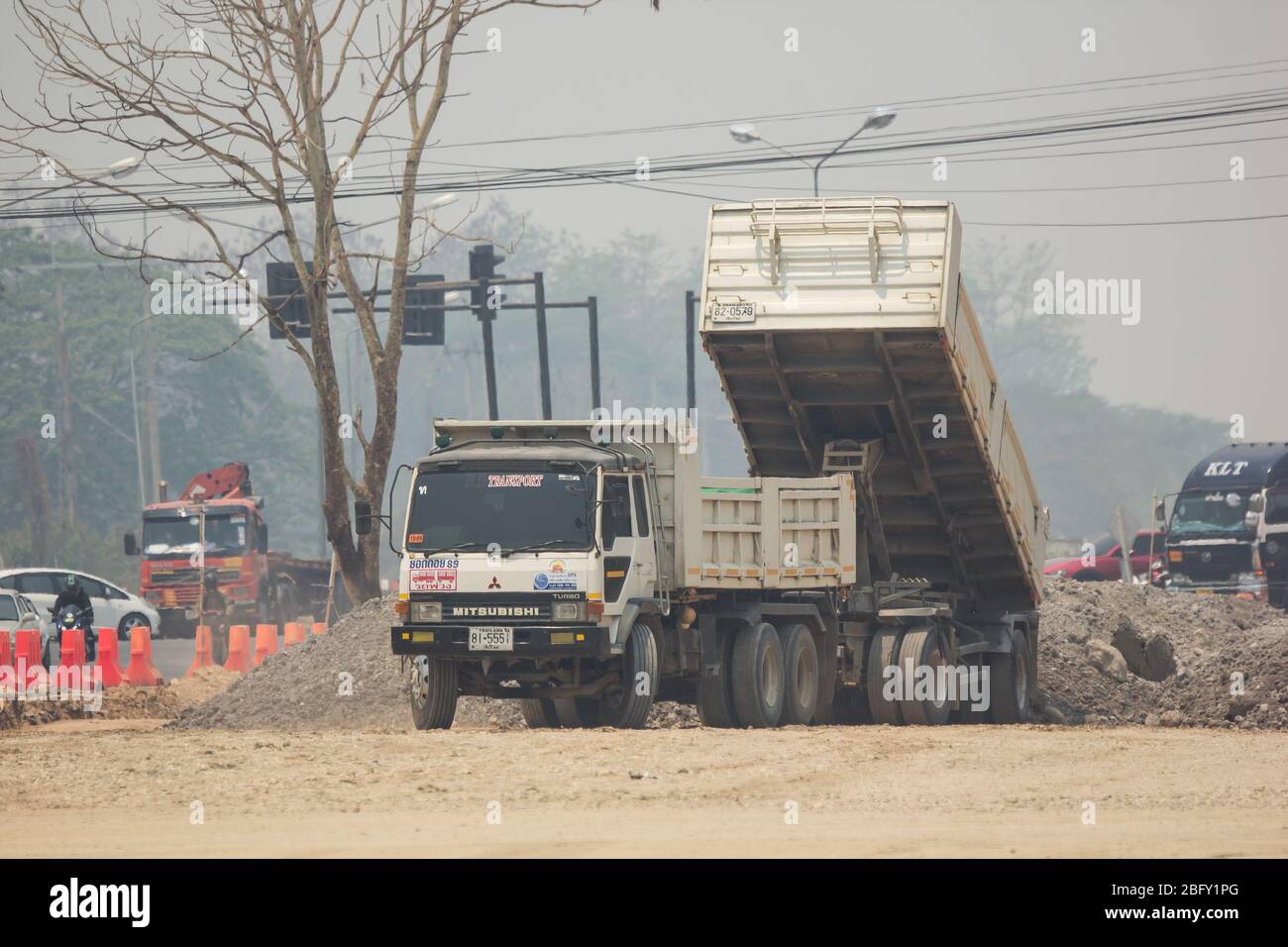Chiangmai, Thailand -  April 4 2020: Private Mitsubishi Fuso Dump Truck.  Photo at road no.121 about 8 km from downtown Chiangmai, thailand. Stock Photo