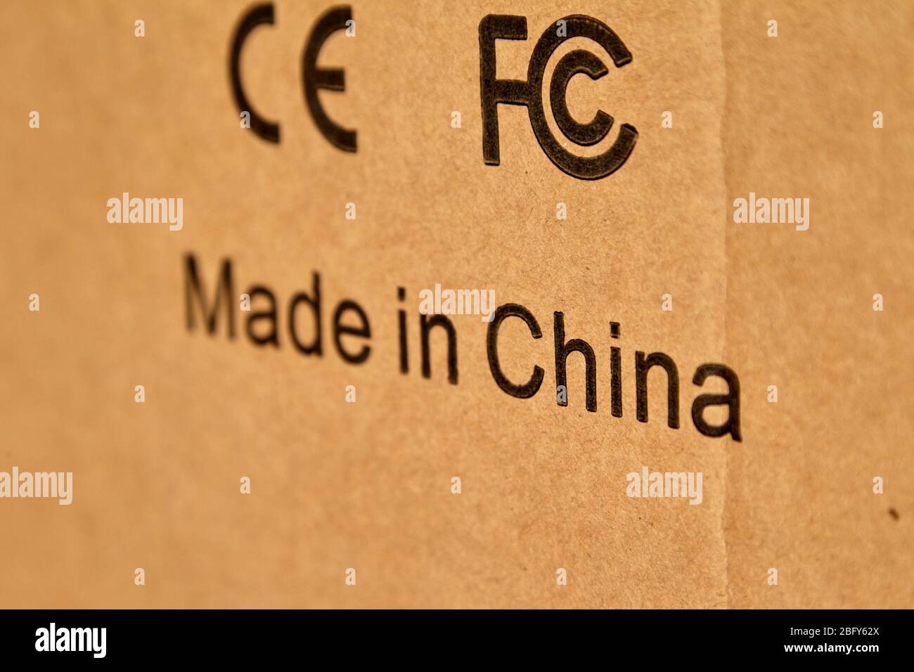 made in china on a cardboard box with ce marking and fcc marking on a shipment from china Stock Photo