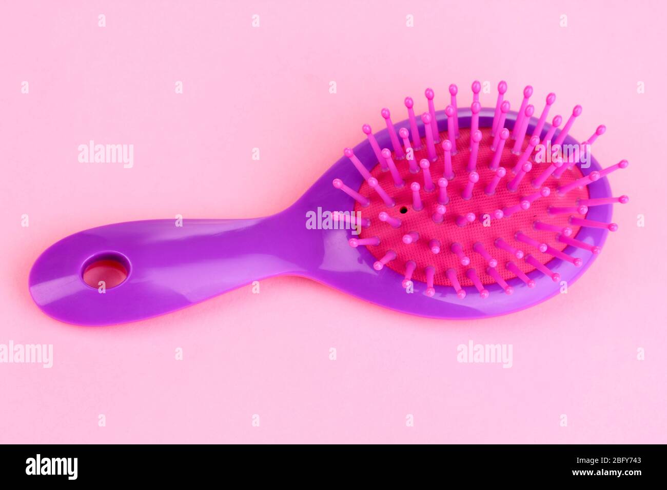 Purple hairbrush hi-res stock photography and images - Alamy