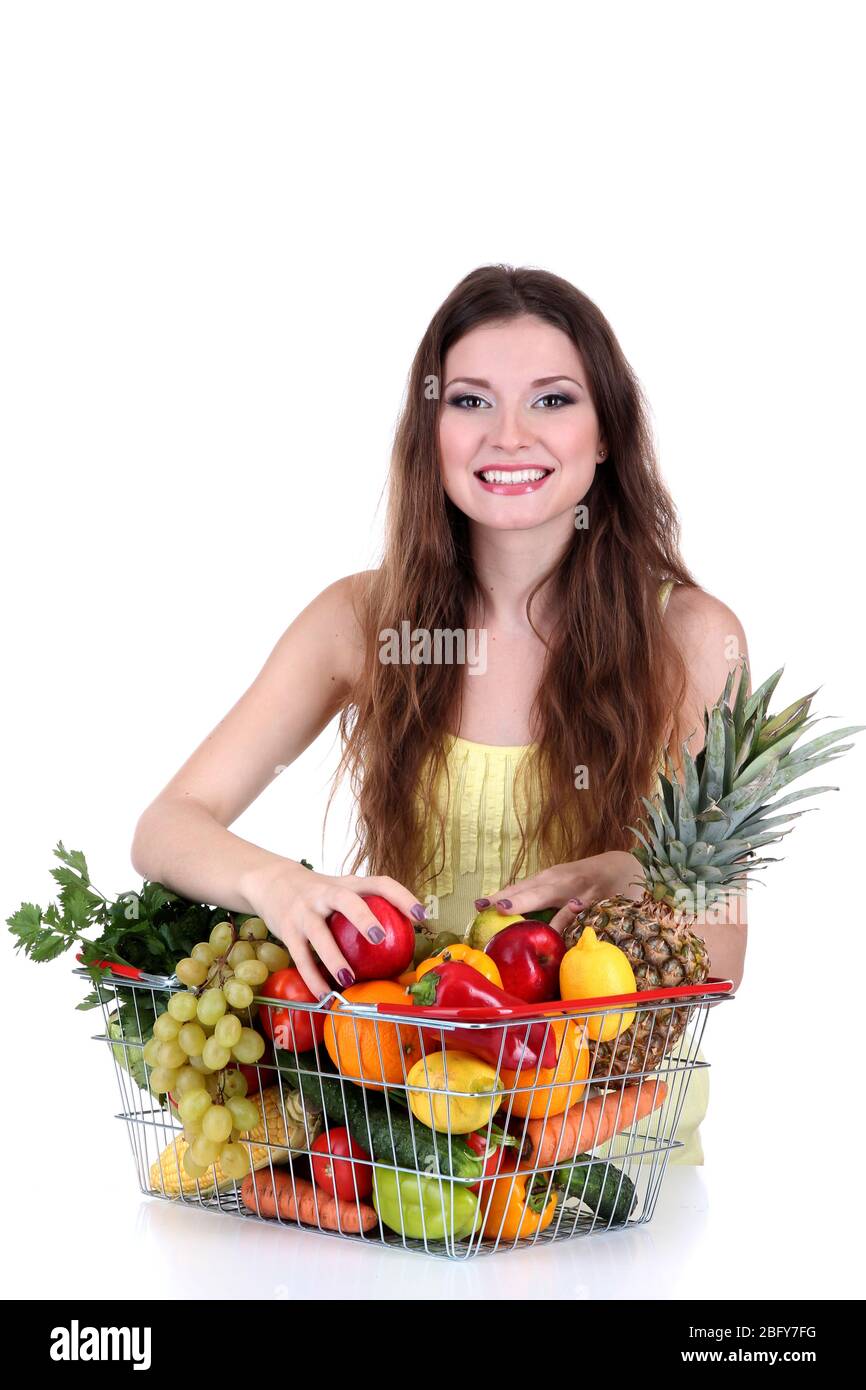 Beautiful woman with healthy food in metal basket isolated on white ...