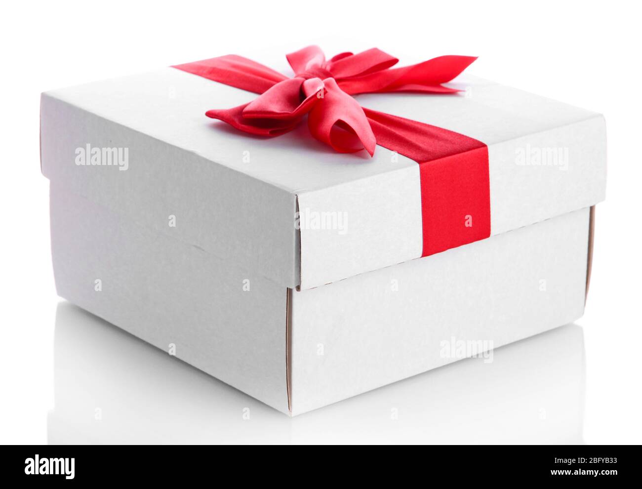 gift box with red ribbon, isolated on white Stock Photo - Alamy