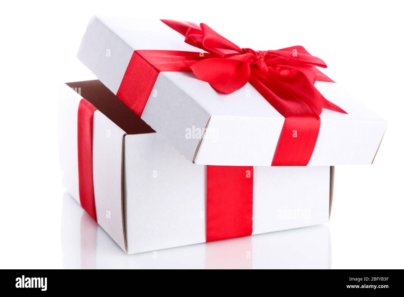 gift box with red ribbon, isolated on white Stock Photo - Alamy