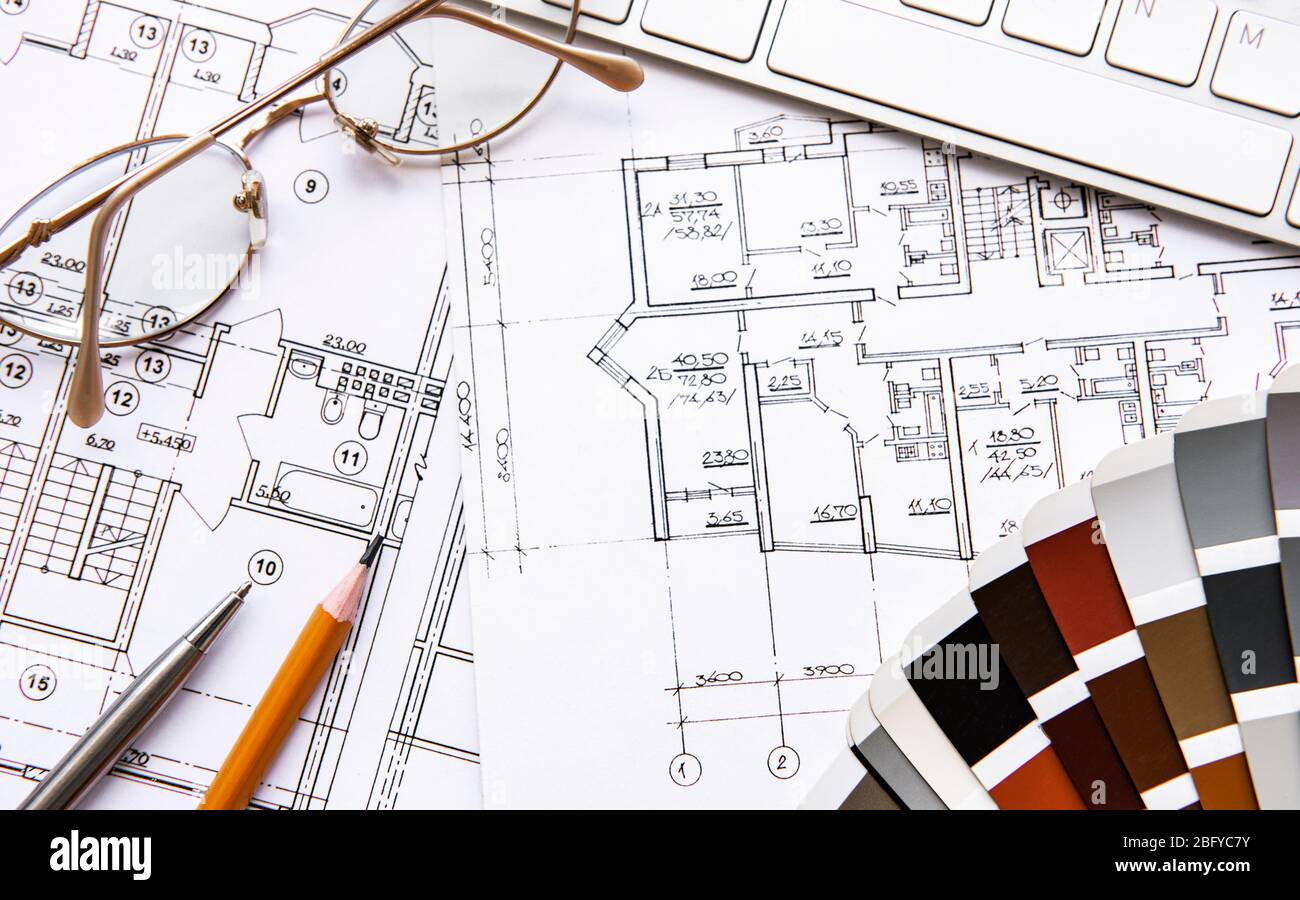 Architect workplace top view. Architectural project, blueprints