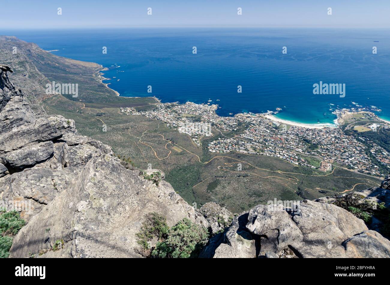 Overlooking Atlantic Ocean and Camps Bay area from top of Table Top Mountain national park Cape town South africa Stock Photo