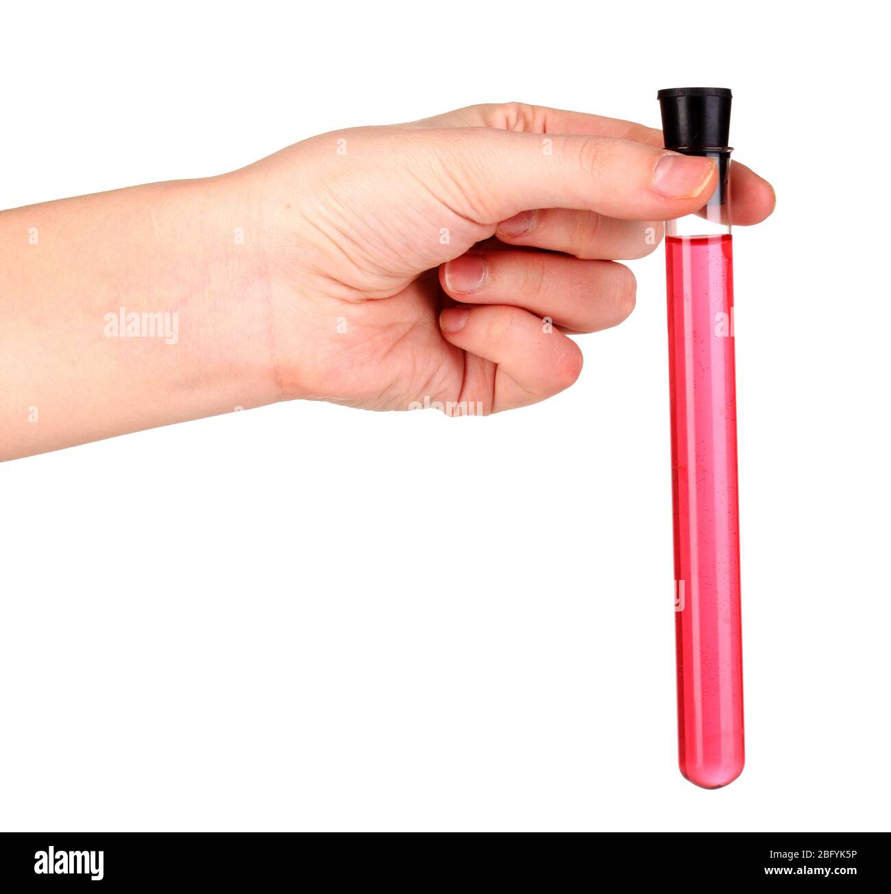 Test-tubes with pink solution in hand isolated on white Stock Photo