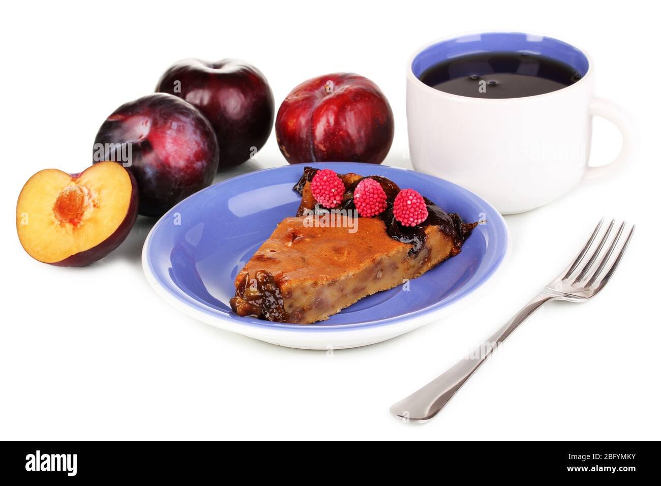 Tasty pie on blue plate with plums isolated on white Stock Photo