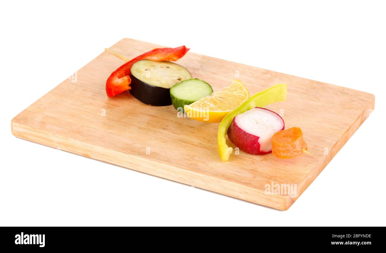 Sliced vegetables on wooden pick isolated on white Stock Photo