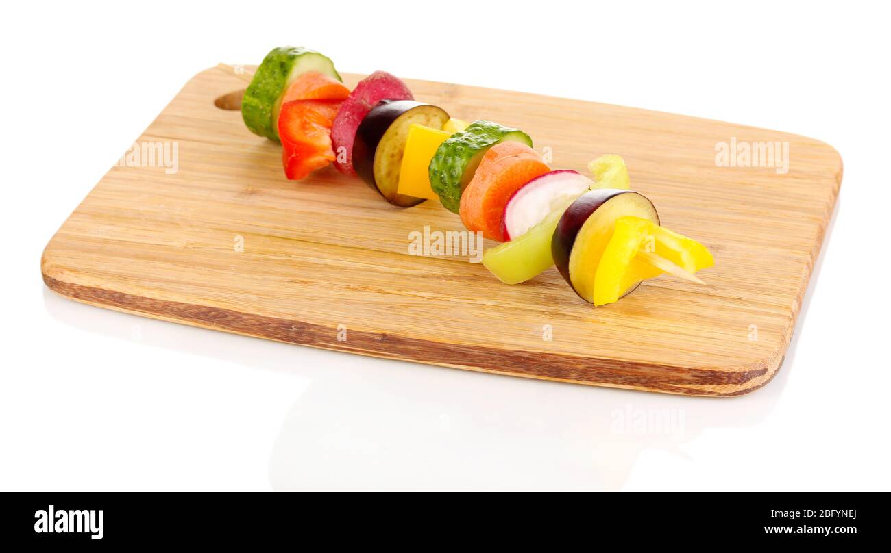 Sliced vegetables on wooden pick isolated on white Stock Photo