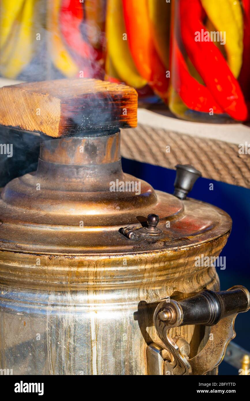 Traditional Russian boiler samovar with a smoke pipe. Stock Photo