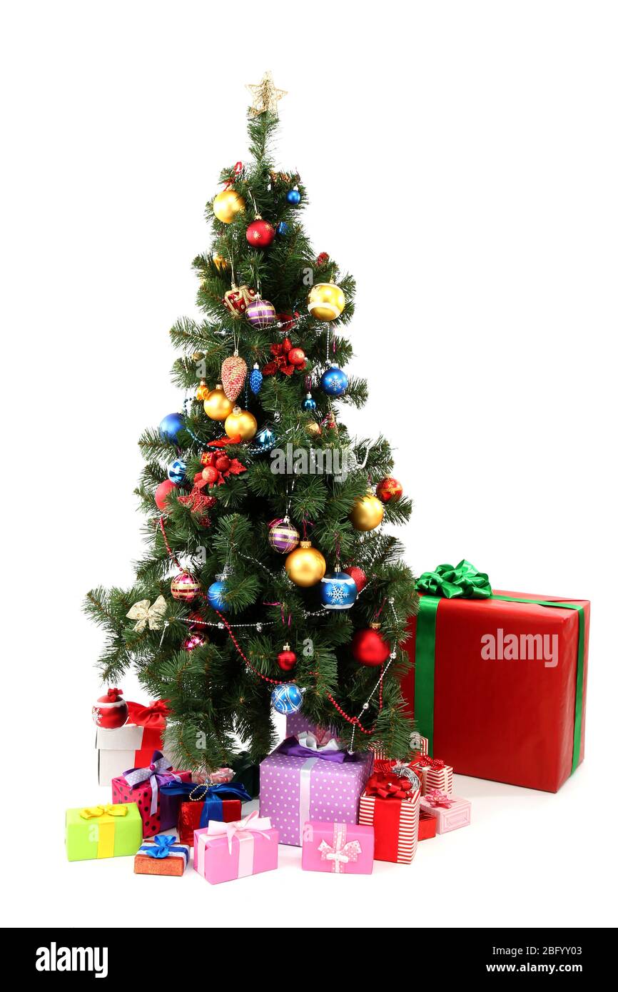 Decorated Christmas tree with gifts isolated on white Stock Photo - Alamy