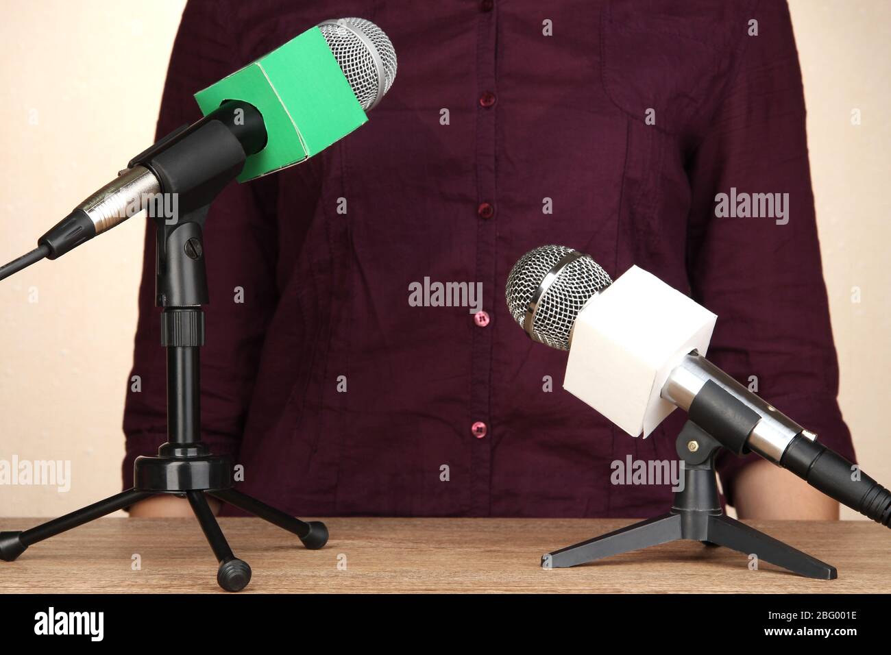 Microphone stands on meeting room table and speaker Stock Photo Alamy