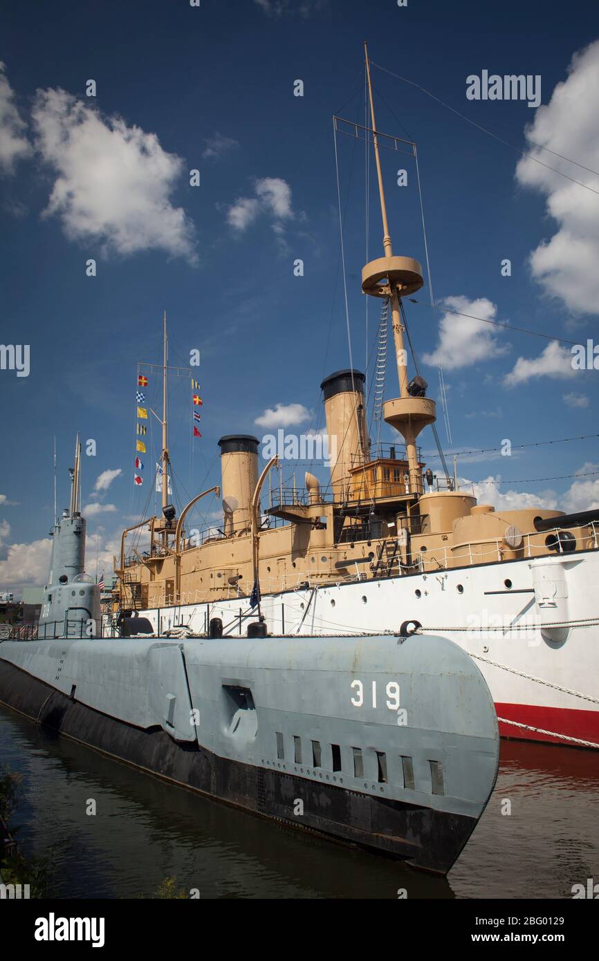 Vertical view of the Becuna submarine and the Olympia Cruiser at the Independence Seaport Museum, Philadelphia, Pennsylvania Stock Photo