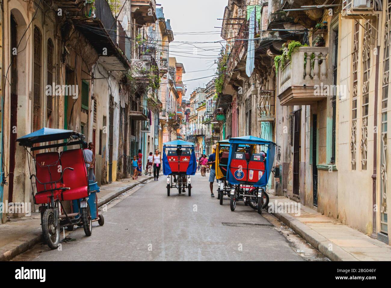 havana street scene,old vintage cars in havana,cuba havana,havana roads,havana  monuments,people in havana street,cuban streets,cuban people,travel Stock Photo