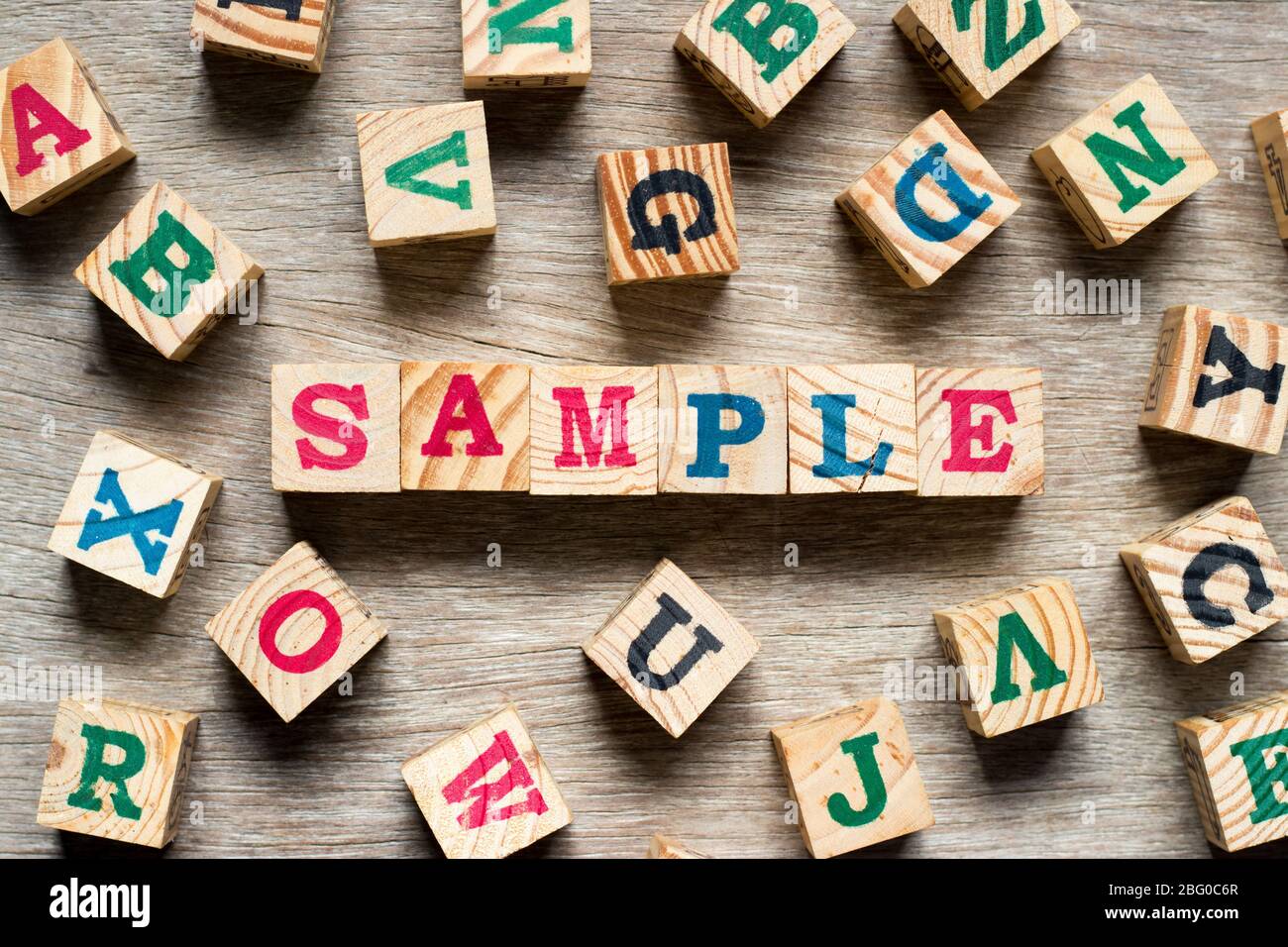 Letter block in word sample with another alphabet on wood background Stock  Photo - Alamy
