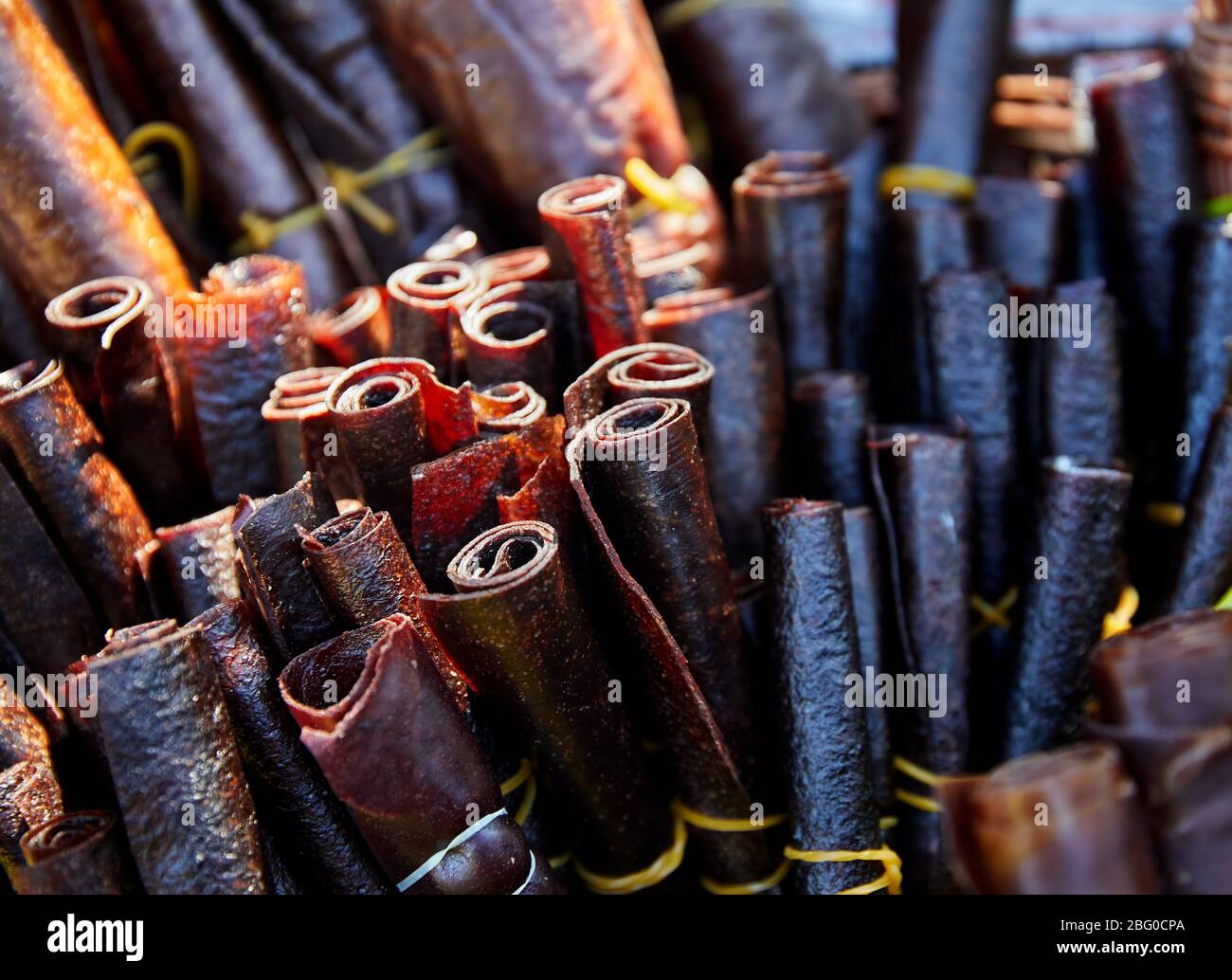 Fruit leather roll from apples on the market in Almaty, Kazakhstan Stock Photo