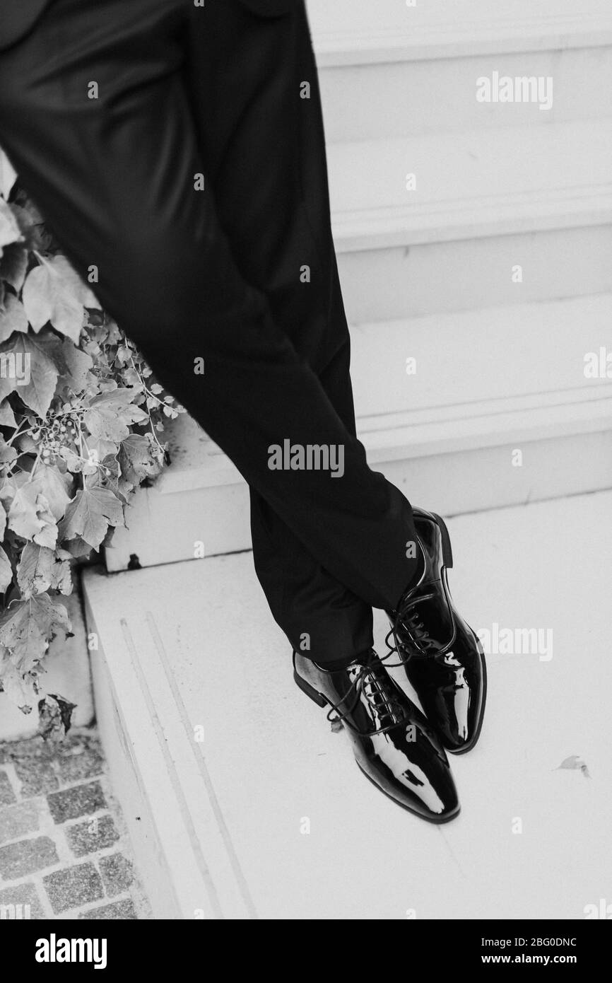 business man wearing black patent shoes. Groom in black patent shoes
