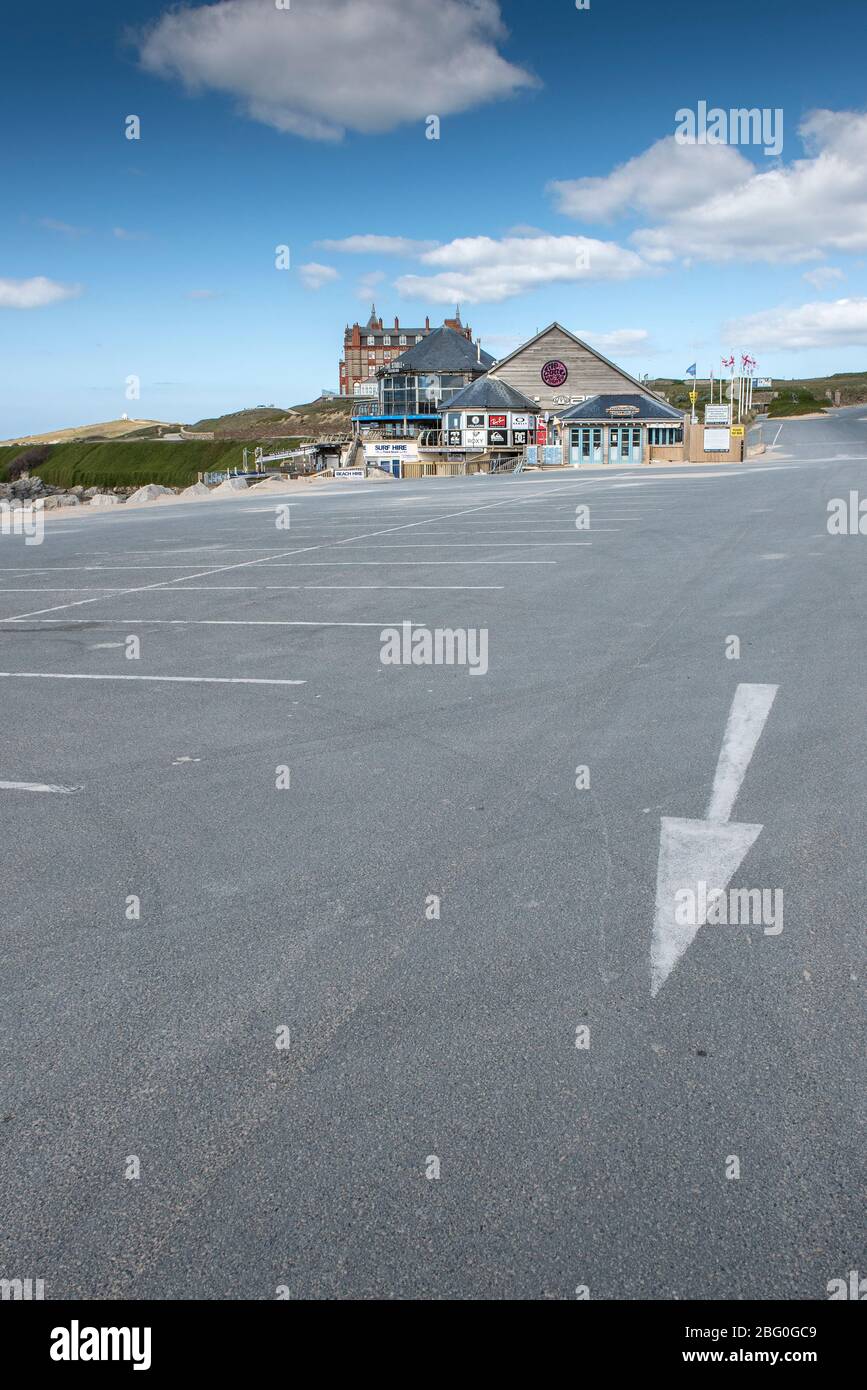 A normally busy car park at Fistral in Newquay now completely deserted as a result of the Covid 19 Coronavirus restrictions. Stock Photo