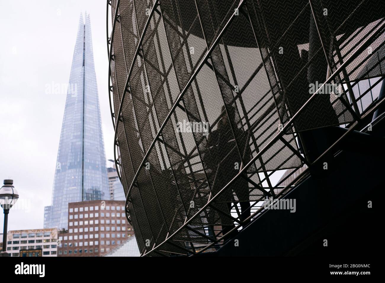 London Bridge pedestrian walkway with the Shard in the background, on a dull winters day Stock Photo