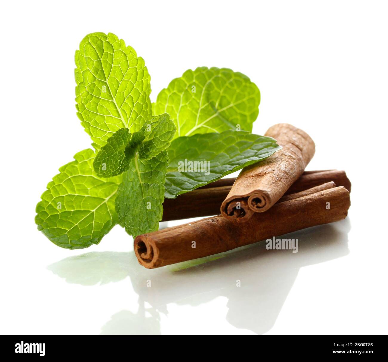Mint with cinnamon isolated on white Stock Photo - Alamy