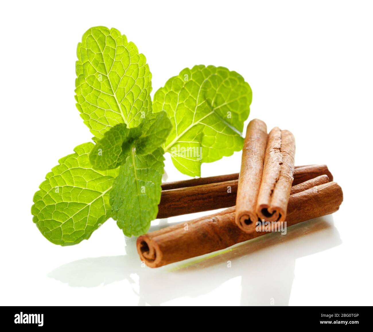 Mint with cinnamon isolated on white Stock Photo - Alamy