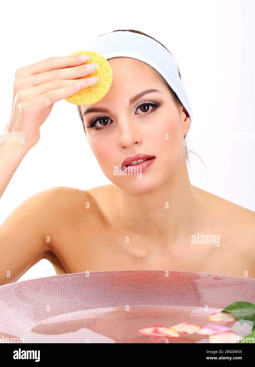 Face washing woman sponge hi-res stock photography and images - Alamy