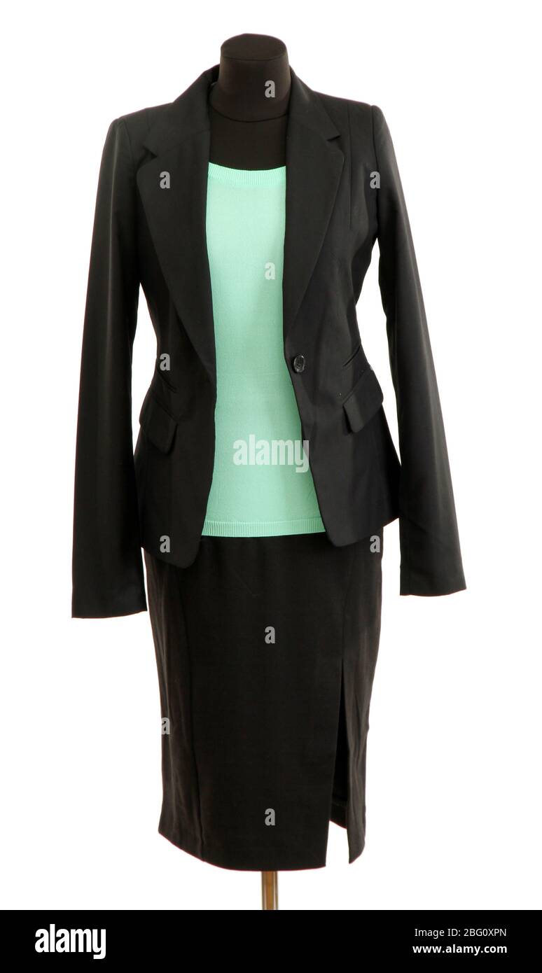 Turquoise blouse and black skirt with coat on mannequin isolated on white Stock Photo