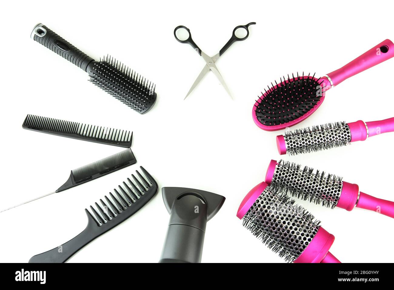 Comb brushes, hairdryer and cutting shears, isolated on white Stock Photo Alamy