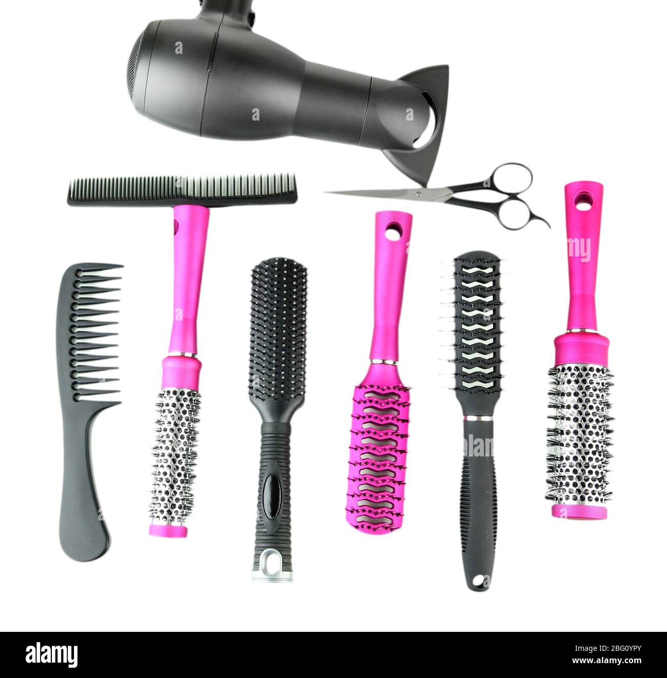 Comb brushes, hairdryer and cutting shears, isolated on white Stock Photo Alamy
