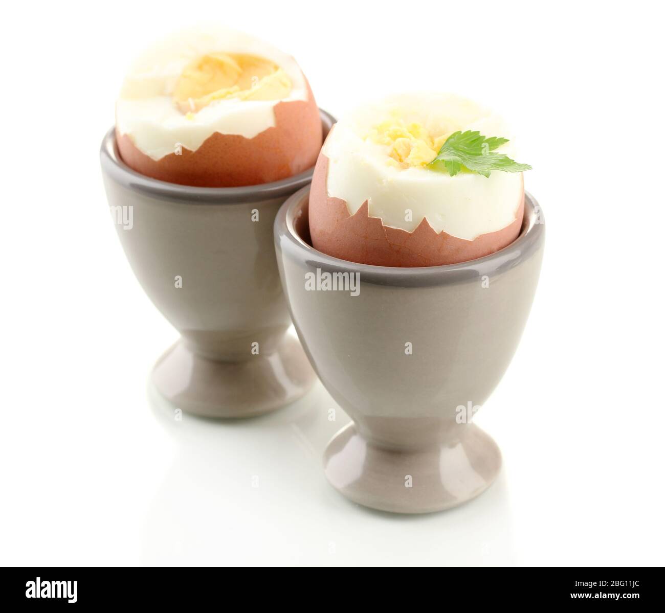https://c8.alamy.com/comp/2BG11JC/boiled-eggs-in-egg-cup-isolated-on-white-2BG11JC.jpg
