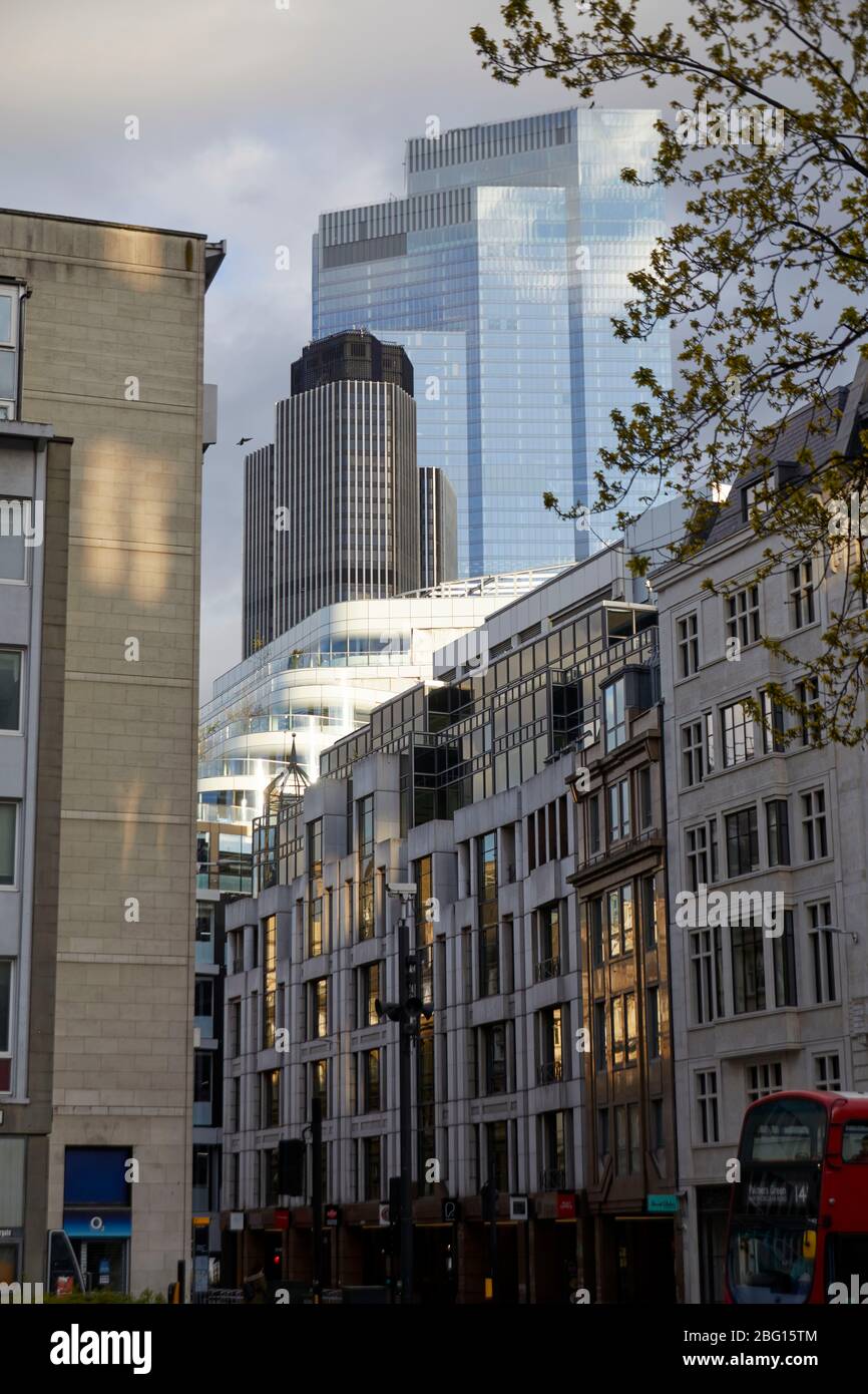 22 Bishopsgate and Tower 42 rising above buildings on London Wall in City of London EC2, England Stock Photo