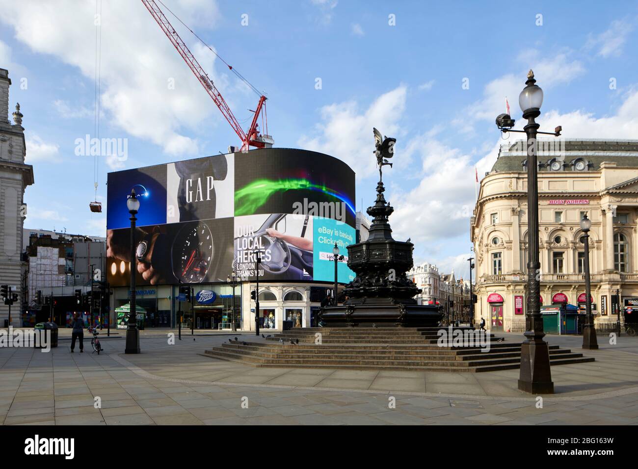 Empty deserted area around Piccadilly Circus during restricted travel of Coronavirus COVID-19 Lockdown in London W1, England Stock Photo
