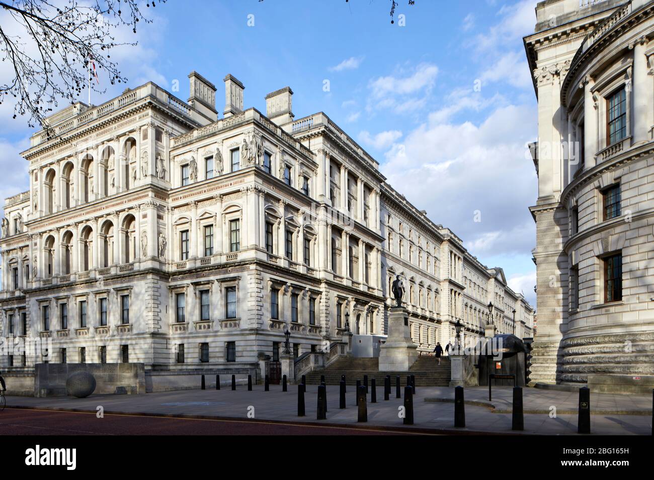 Empty deserted street of Horse Guards Road with Foreign and Commonwealth Office building during restricted travel of Coronavirus COVID-19 Lockdown in Stock Photo