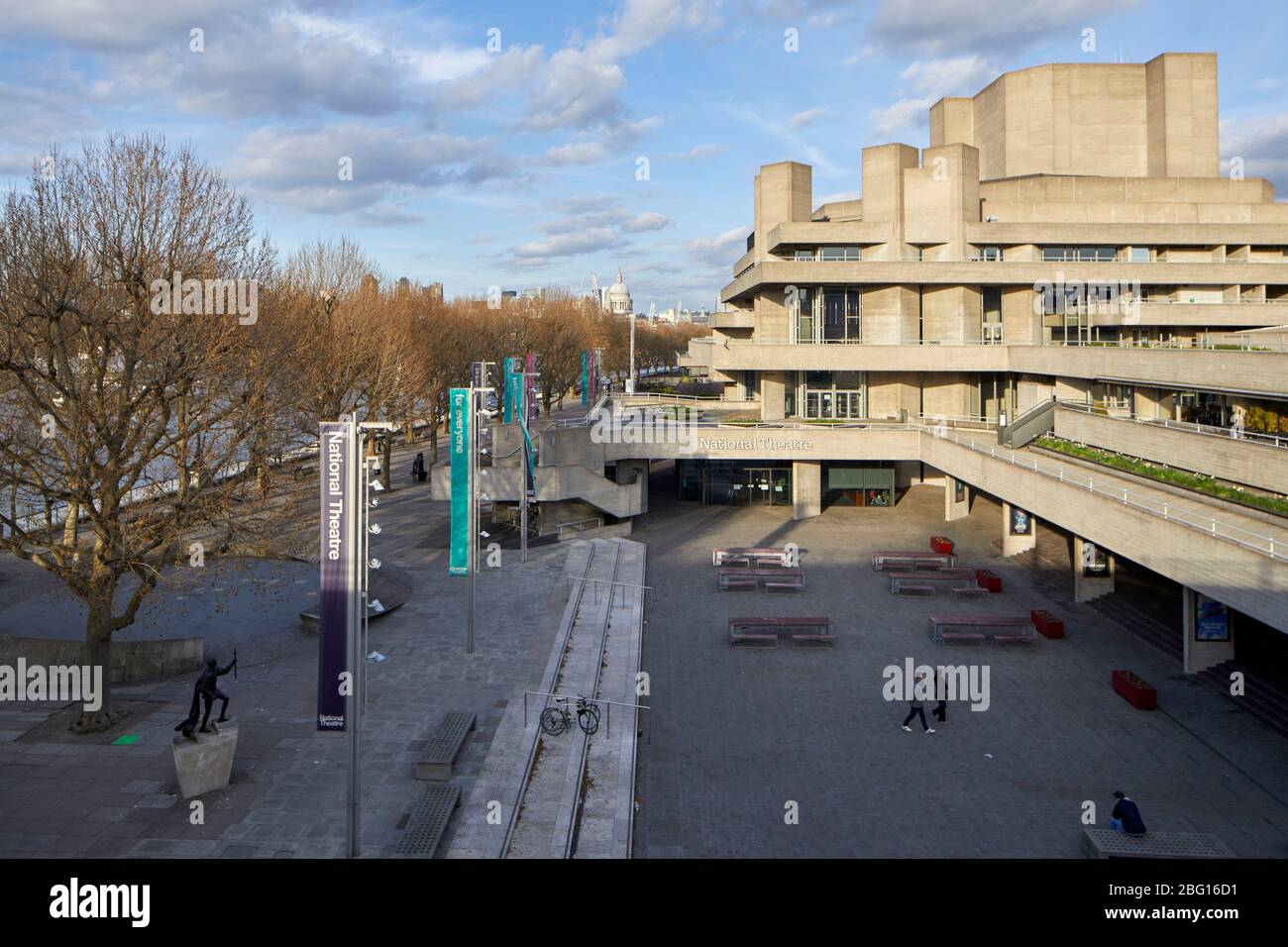 National Theatre with empty deserted South Bank walkway during restricted travel of Coronavirus COVID-19 Quarantine Lockdown in London SE1, England Stock Photo