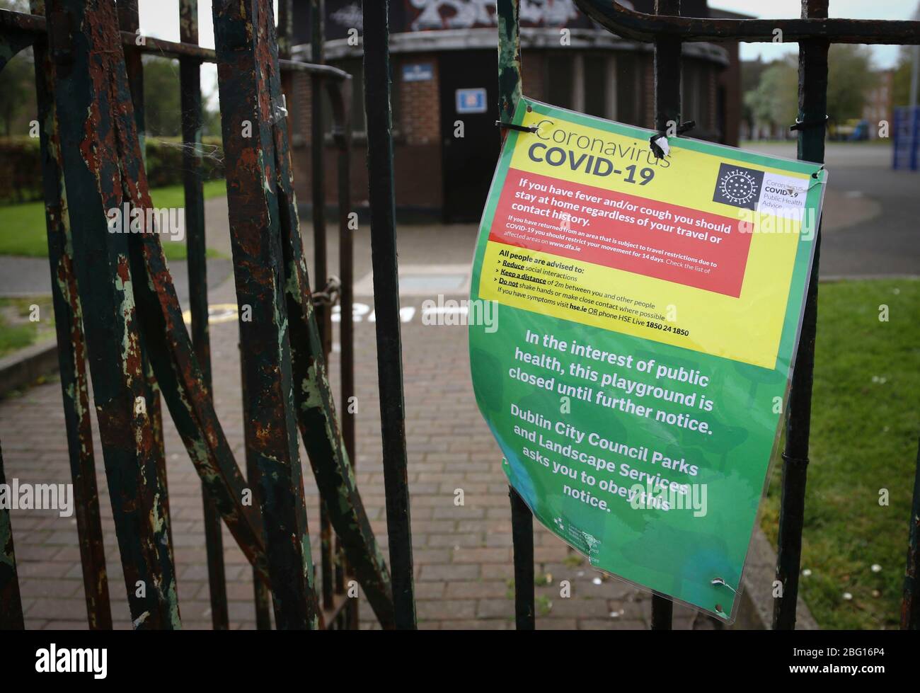 Dublin, Ireland - April 19, 2020: a Covid-19 public health notice at a playground closed due to covid-19 lockdown restrictions. Stock Photo