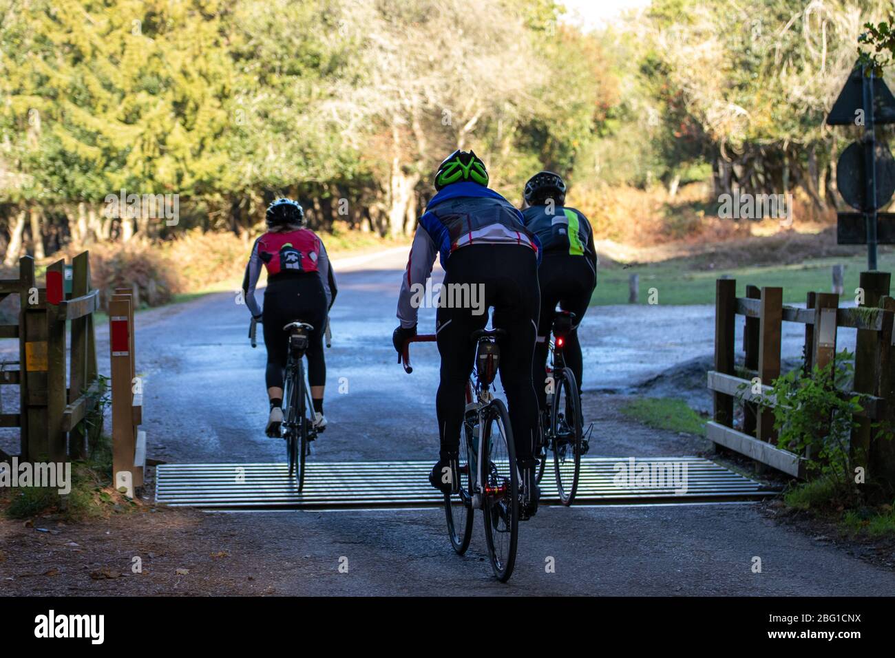 A group of cyclists riding their bikes on country roads in the New