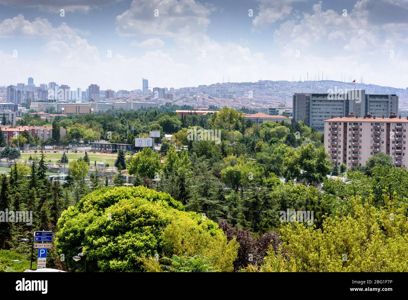 Ankara, Turkey - July 24, 2018: View above of Ankara houses with tiled roofs and skyscrapers Stock Photo