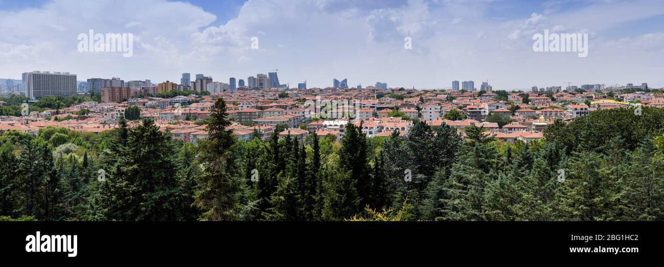 Ankara, Turkey - July 24, 2018: View above of Ankara houses with tiled roofs and skyscrapers Stock Photo