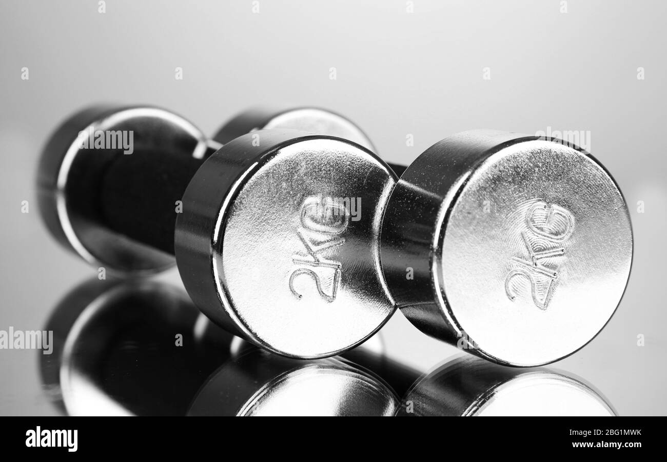 2kg Visualised Dumbbells at 2 kg on grey background Stock Photo - Alamy