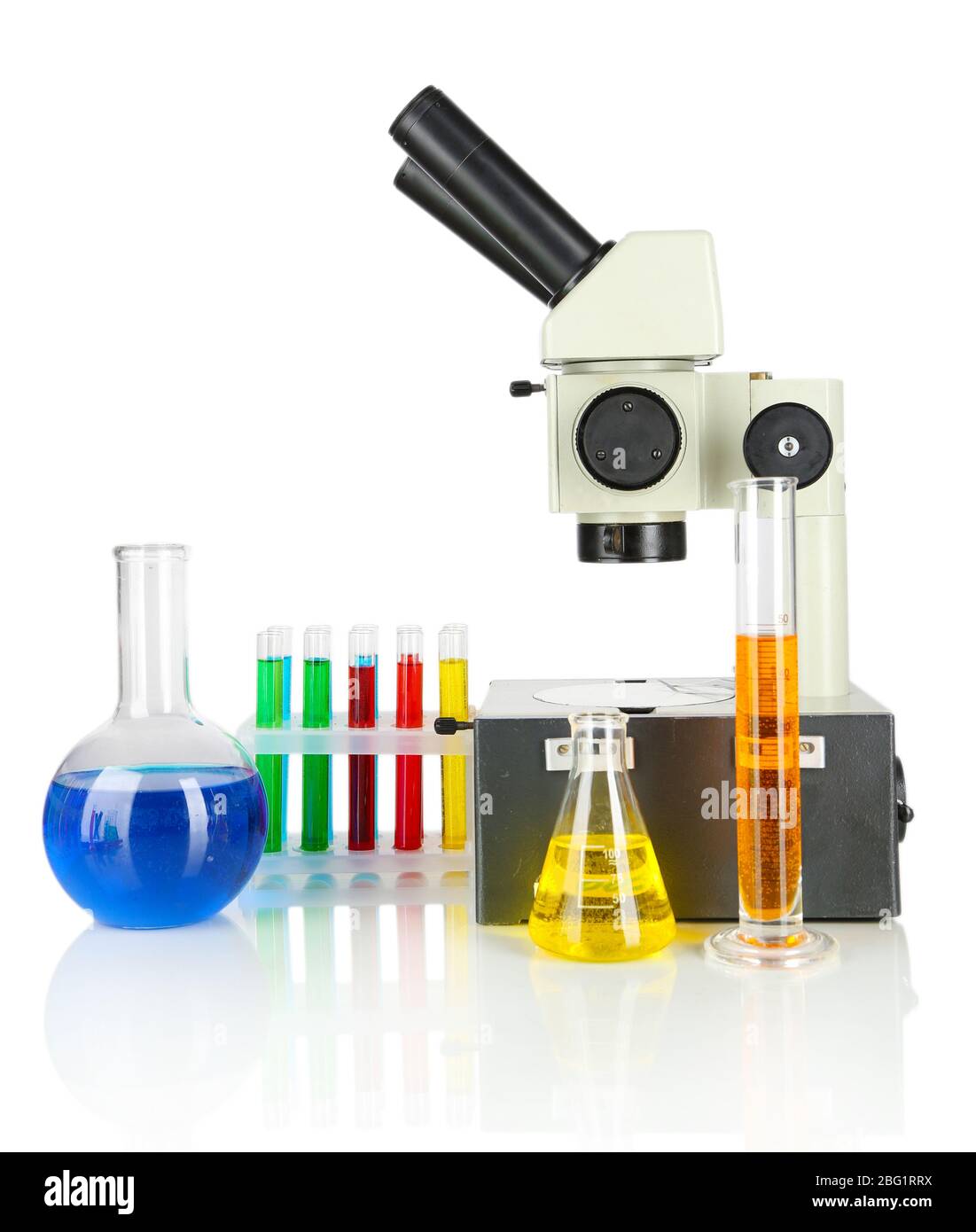Test tubes with colorful liquids and microscope isolated on white Stock ...