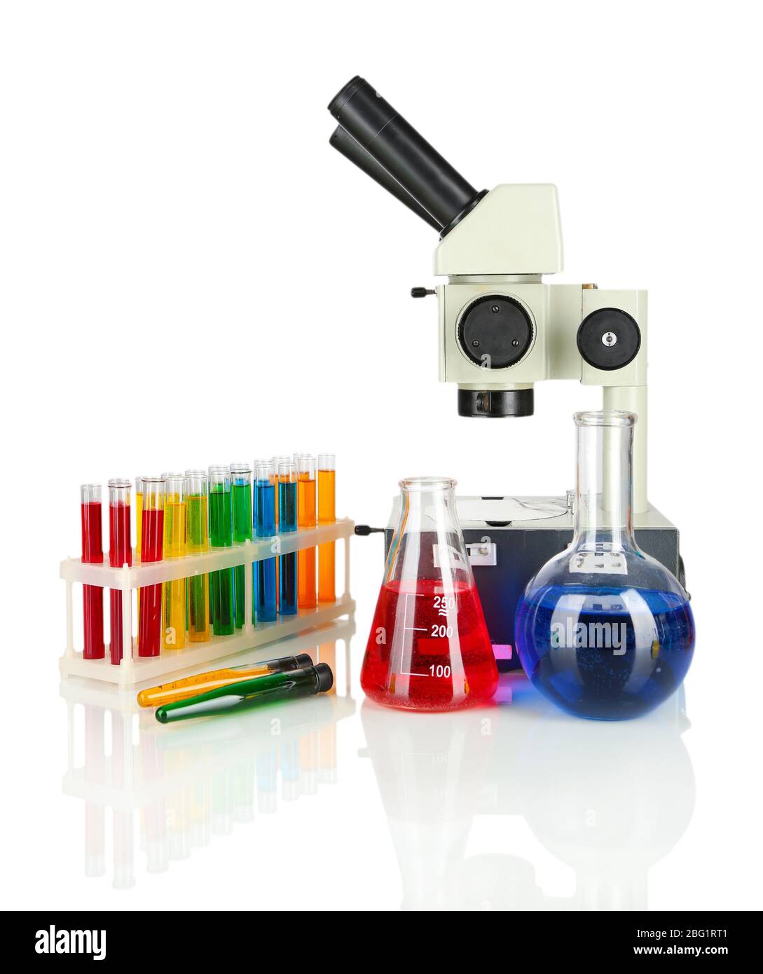 Test tubes with colorful liquids and microscope isolated on white Stock ...