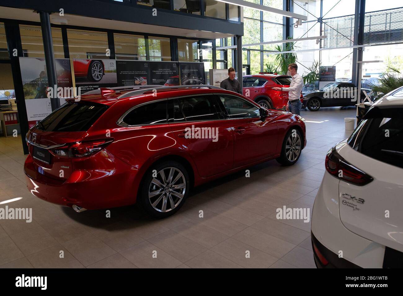 Cologne Germany 20th Apr 2020 An Employee Demonstrates A Car At The Schmitz Car Dealership In