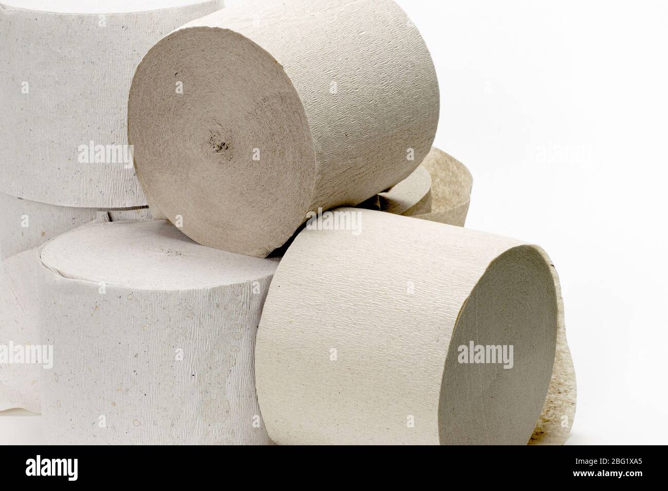 several rolls of toilet paper on a white background close-up Stock Photo