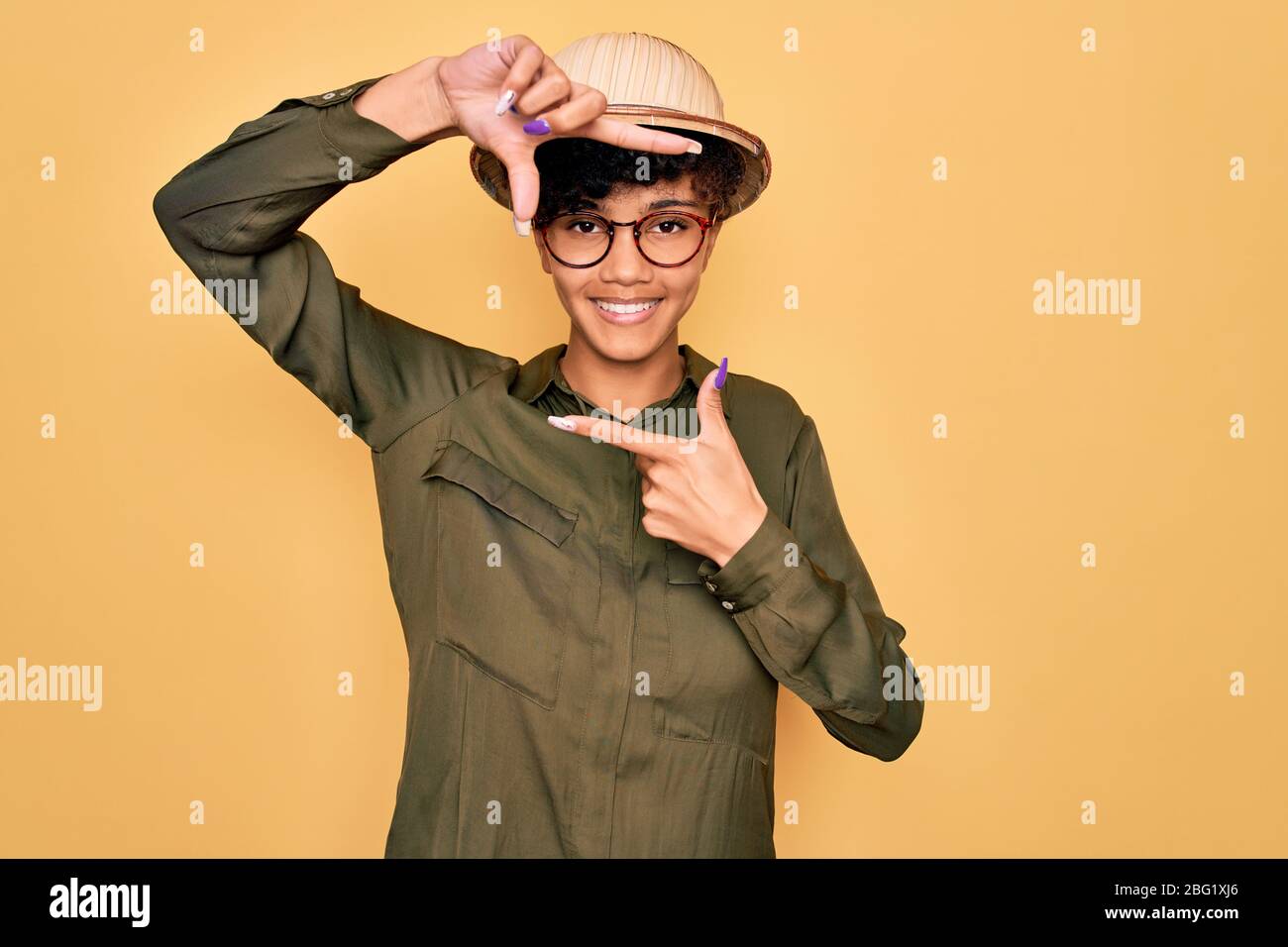 Young beautiful african american tourist woman wearing glasses and ...